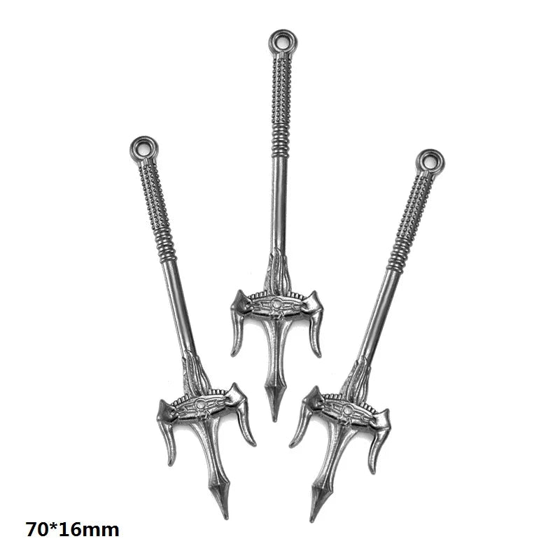 A pair of silver-toned alloy charms featuring intricate, ornate designs for DIY jewelry making.