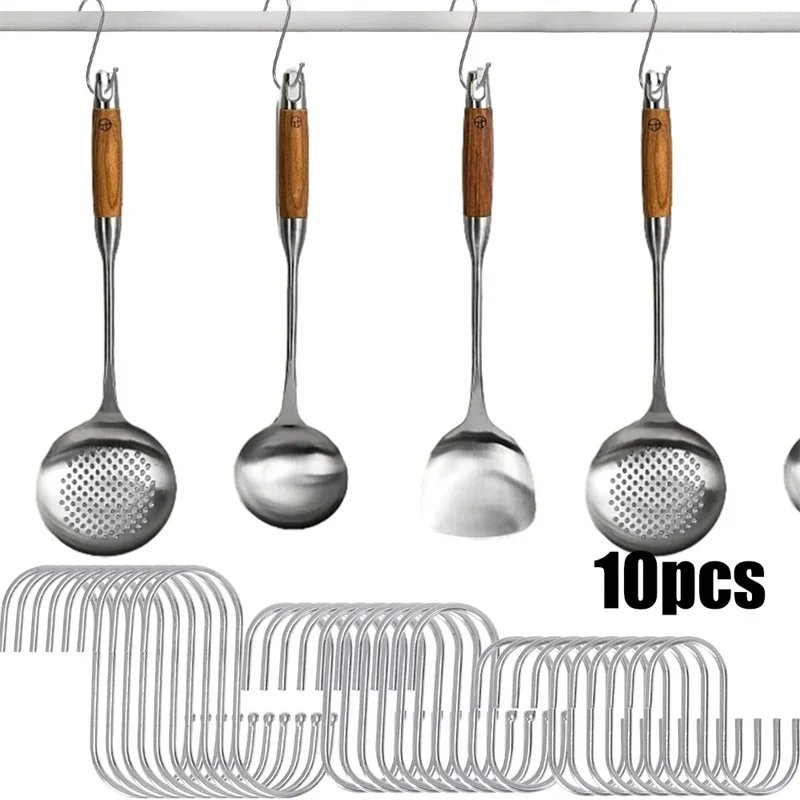 A set of five stainless steel hanging spoons and a bundle of metal wire hooks.