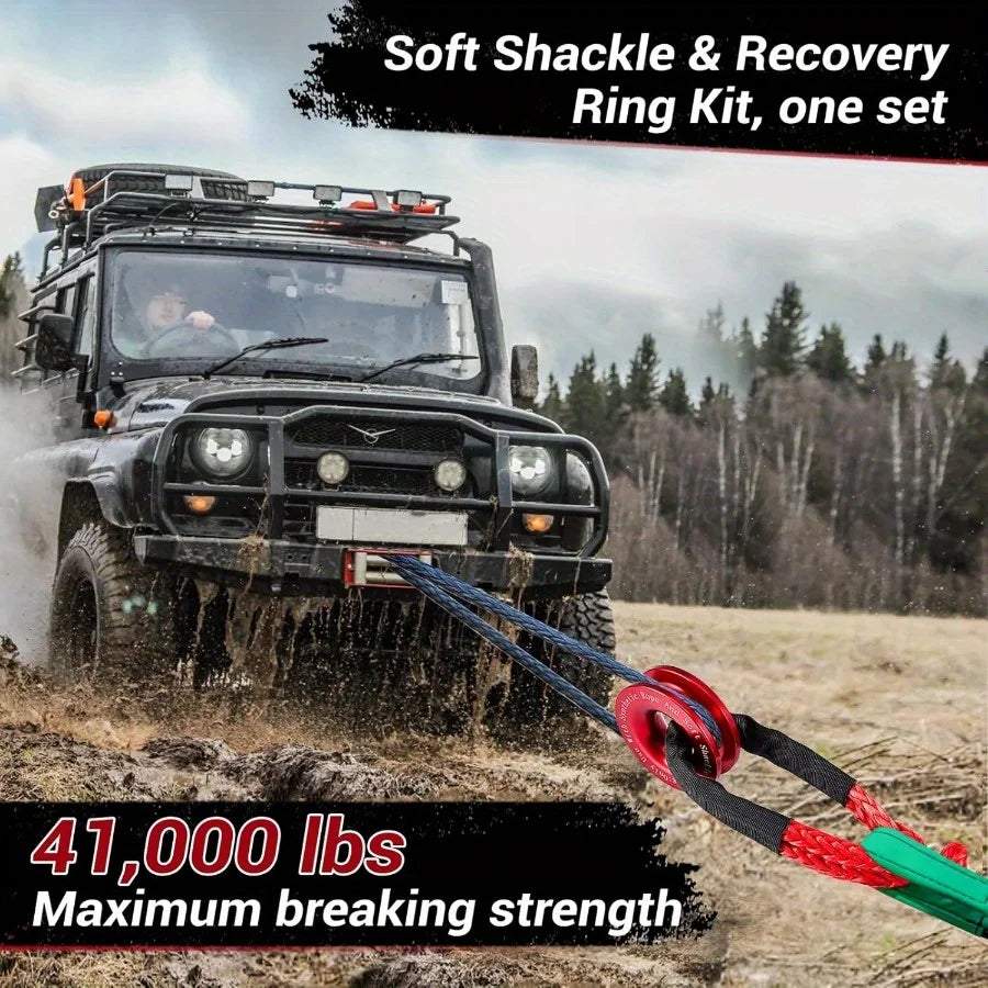 A black Jeep is shown with a soft shackle and recovery ring kit attached, demonstrating 41,000 lbs maximum breaking strength.