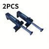 Two black precision wire clips and liners for construction