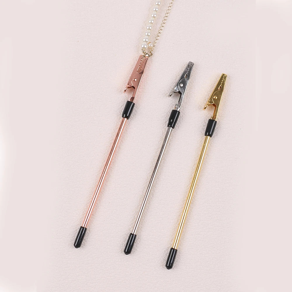 Three precision jewelry clasp helper tools in rose gold, silver, and gold finish displayed on a light background.