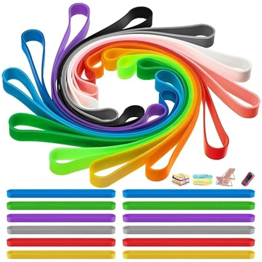 A colorful set of reusable silicone elastic rubber bands arranged in a spiral pattern.