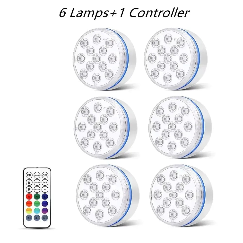 Six lumières LED submersibles pour piscine et un contrôleur sont exposés en rang.