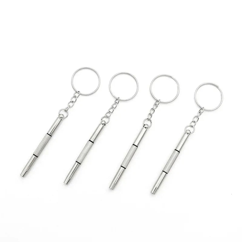 A set of precision multi-purpose eyeglass repair screwdrivers with metal loops.