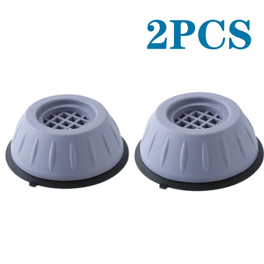Two pairs of anti-vibration silicone feet pads for appliances, gray and black.