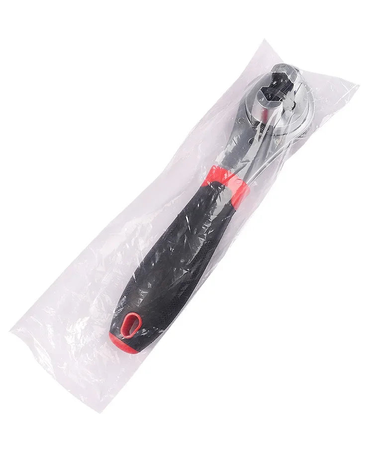 A black and red adjustable chrome ratchet wrench is sealed in a clear plastic bag.