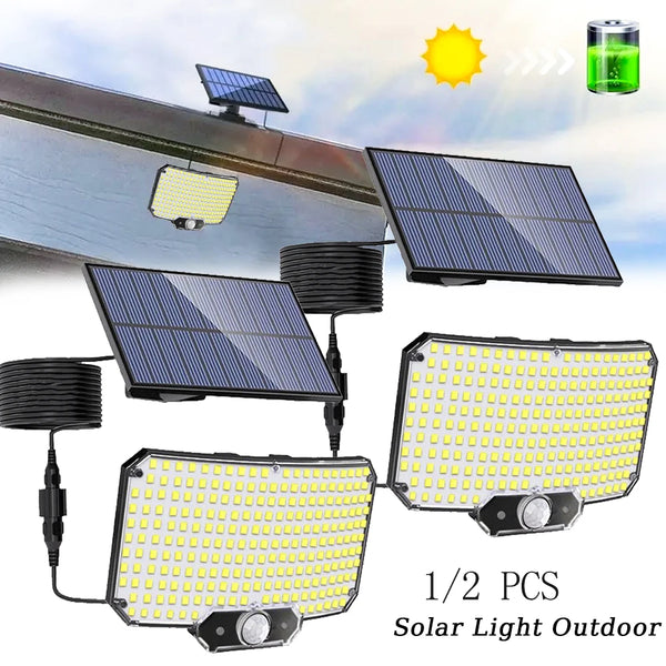 Two solar light outdoor flood lights with integrated motion sensors and solar panels