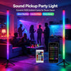 A colorful sound pickup party light lamp illuminating a room with people enjoying music.