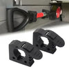 A pair of black quick fist clamps used for mounting, shown in a close-up view.