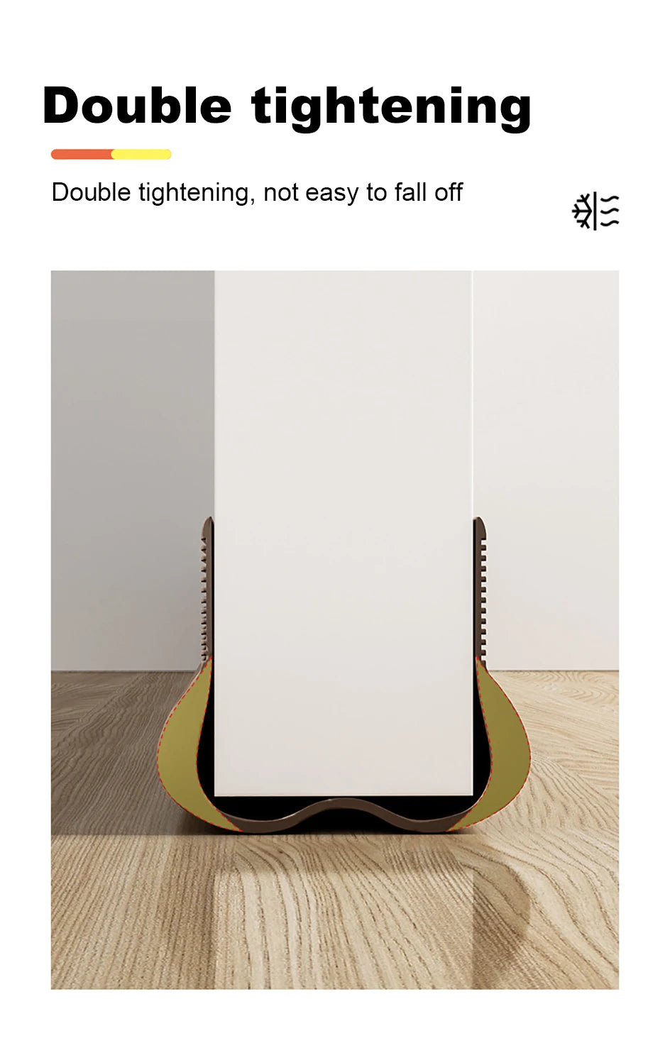 A white door draft stopper with a gold-colored flexible strip, shown against a wooden background.