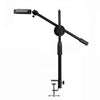 Black versatile overhead tripod with a boom arm and ring light for photography or video.