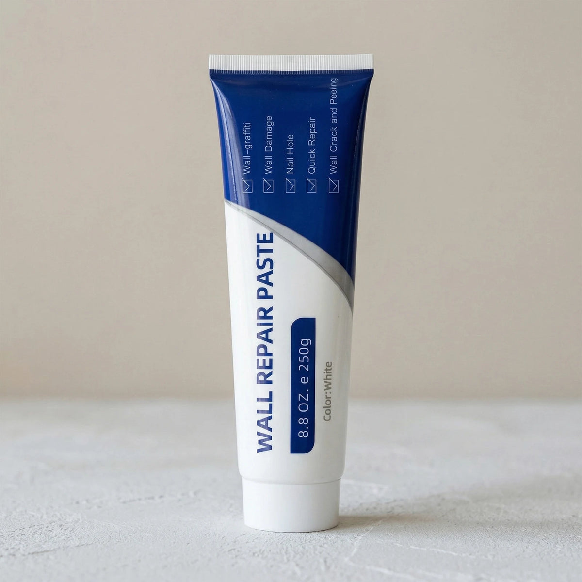 A tube of Wall Repair Paste for drywall repair and sealing is shown against a light background.