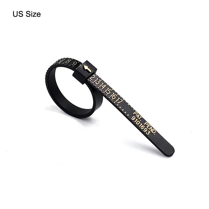 A black precision plastic ring sizer with numbered markings is shown on a white background.