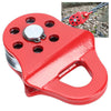 A red heavy duty winch snatch block with a silver mounting plate and a handle, shown next to a rope.