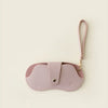A light pink PU leather eyeglasses case with a lychee pattern and a thin pink strap.