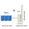 A set of toilet brush heads and a beige base handle for cleaning.