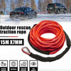 A spool of red rescue traction rope is shown next to a black SUV in an outdoor setting.