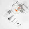 A set of tools and a hinge hole locator jig for cabinet work, including a clear tube, pliers, and various metal tools.