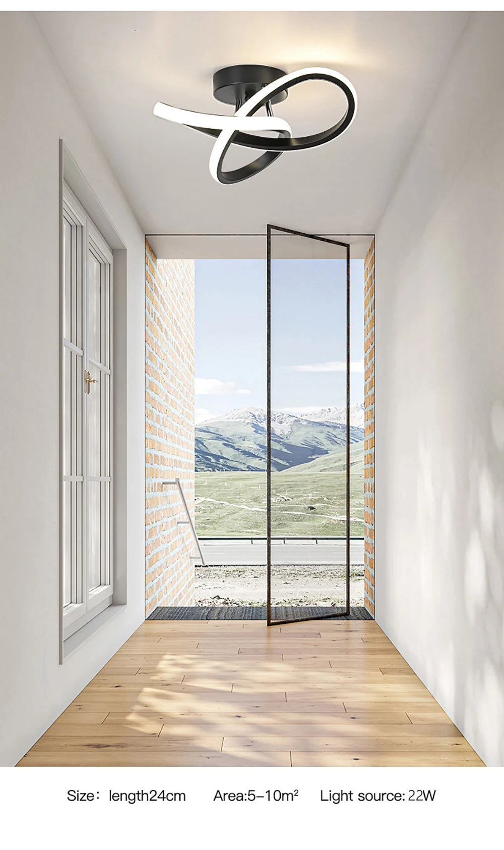 Modern LED ceiling light fixture suspended in a bright room with a view of mountains and fields.