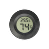 A round, black digital indoor humidity and temperature meter displaying 29.5°C and 74%.