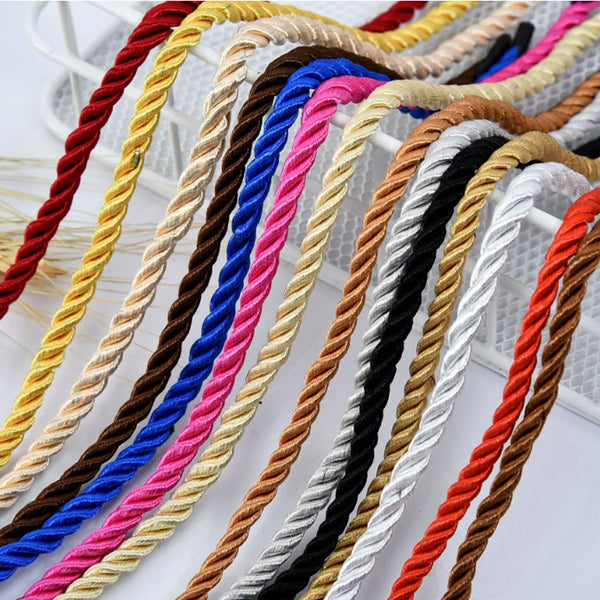 A collection of colorful adjustable polyester craft cords in various colors like red, yellow, blue, pink, brown, black, and w
