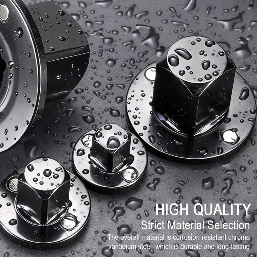 A set of four black precision impact socket adapters made of corrosion-resistant chrome vanadium steel resting on a wet, dark