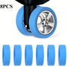Eight protective luggage wheels in bright blue and silver are shown, including a main wheel and several individual components