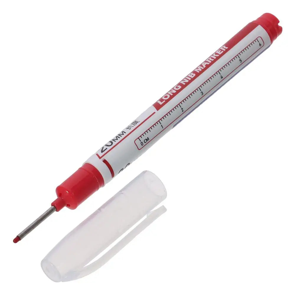 A long red and white marker pen with a clear tip is shown next to its detached tip.