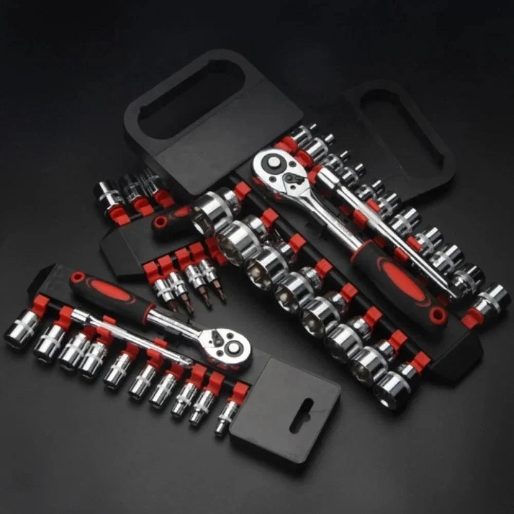 A black 12-piece universal wrench and socket repair kit with various tools laid out on a dark surface.