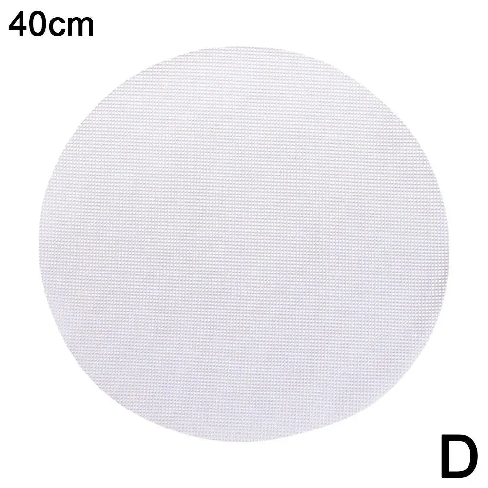 A circular white silicone steamer mat with a diameter of 40cm.