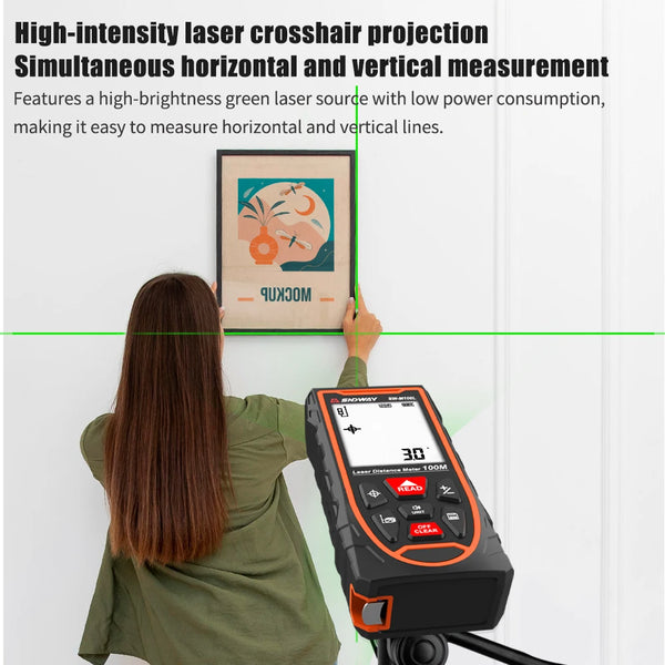 A person is using a high-intensity laser crosshair projection tool to measure horizontal and vertical lines on a wooden board