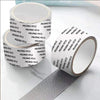 Rolls of white self-adhesive mesh repair tape with black text and a perforated strip shown on a white surface.