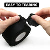 Hands are tearing a black electrical tape product, demonstrating its easy to tearing feature.