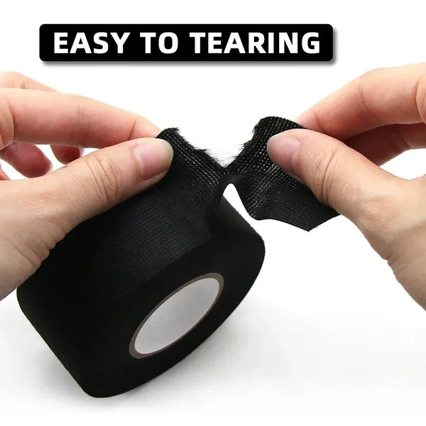 Hands are tearing a black electrical tape product, demonstrating its easy to tearing feature.