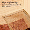 A close-up of a stainless steel litter scoop with a right angle design being used to clean pet waste from a litter box.