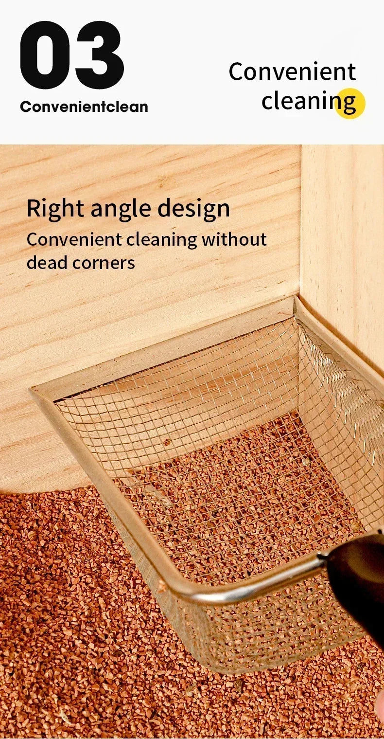 A close-up of a stainless steel litter scoop with a right angle design being used to clean pet waste from a litter box.