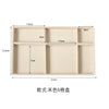 A rectangular light beige plush velvet jewelry storage tray divided into six compartments.