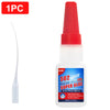 A red dropper bottle of Super Glue adhesive with a white applicator tip.