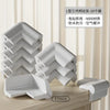 A set of L-shaped three-piece corner and table edge guards in white, showing the product's design and thickness.
