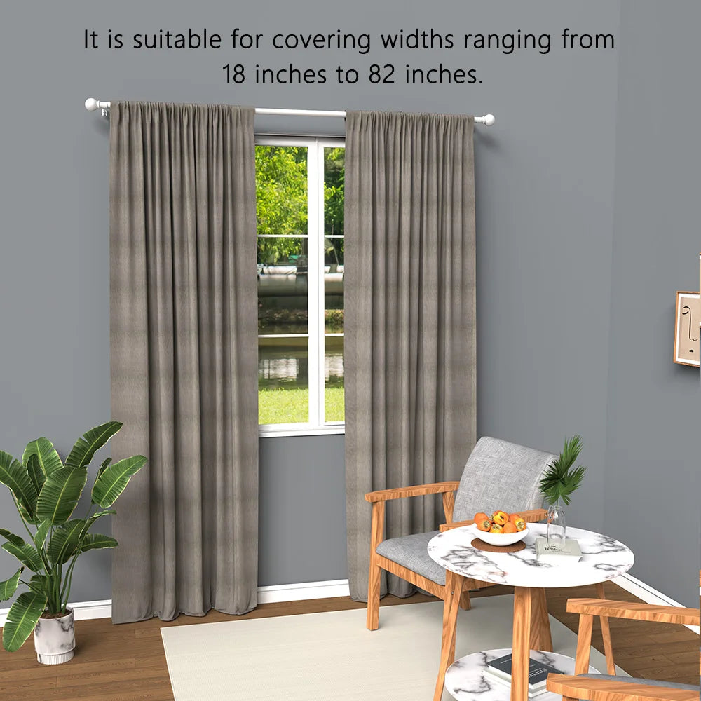 Gray iron spliced curtain rods shown next to a window with gray curtains covering widths from 18 to 82 inches.
