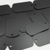 A collection of 50 black aluminum metal stamping tags for crafts and keychains.