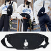 Black linen crossbody waist bag with a hand gesture design shown in various lifestyle photos.