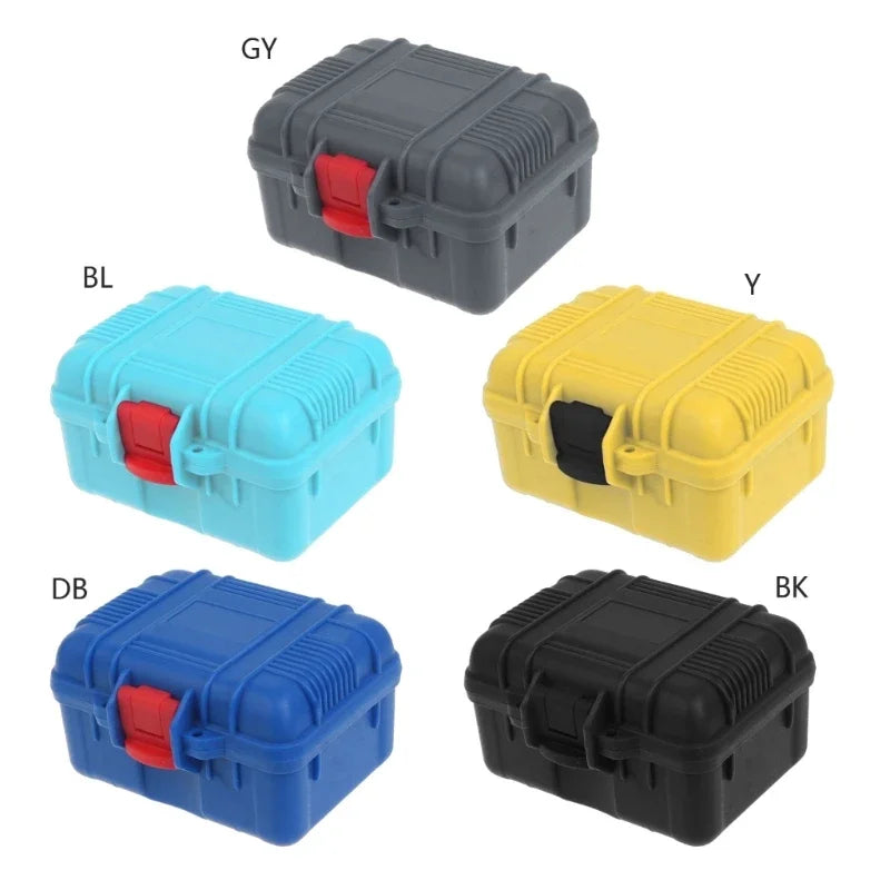 A collection of five impact-resistant watch storage cases in gray, blue, yellow, black, and a light blue color.