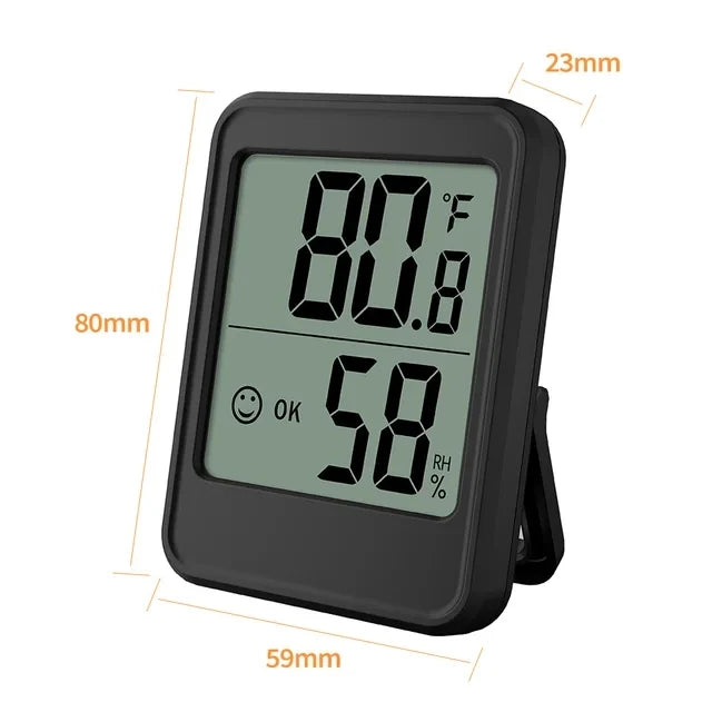 A black portable digital thermometer and hygrometer displaying a temperature of 80.8 degrees Fahrenheit and 58% relative humi