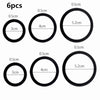Six pairs of black silicone rings for erection enhancement, showing various sizes.