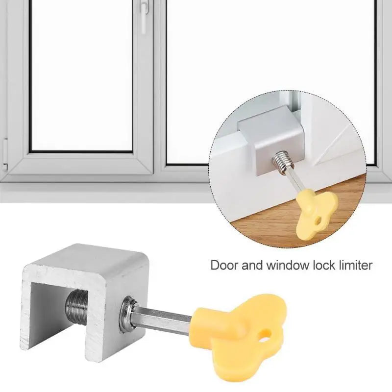 A door and window lock limiter showing a white plastic fitting and a yellow locking mechanism.
