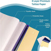 A stack of 4 layer premium tattoo paper includes a transfer sheet, protective tissue, purple carbon sheet, and yellow backing