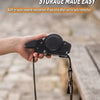 A hand holds a black auto retracting strap with a black cord attached, demonstrating its storage feature.
