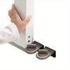 A hand is operating an aluminum sliding window safety lock mechanism on a white frame.