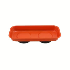 An orange magnetic parts tray designed for holding screws, nuts, and bolts.